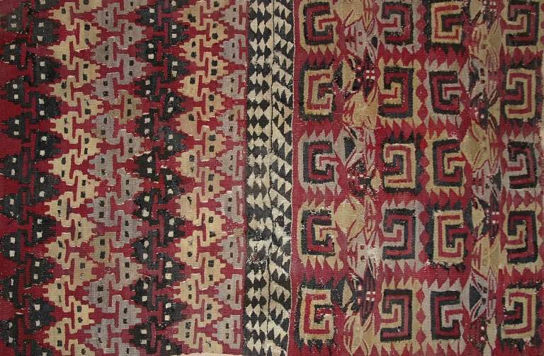 An example of Inca art that exemplifies its geometric patterns and importance of textiles