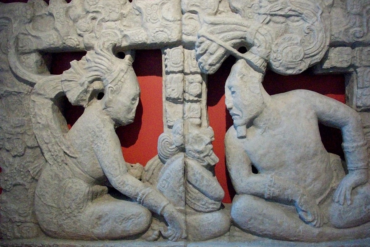 Representation of Ixchel (left) and Itzamná (right) on the Sacred Mountain prior to the creation of the world. Copy of a throne back carved in limestone. Usumacinta River Basin, Chiapas. Late Classic. Amparo Museum, Puebla.